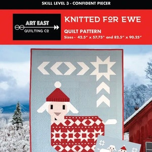 May include: Knitted For Ewe quilt pattern featuring a red and white patterned sheep with a red hat. The pattern is available in two sizes: 42.5 inches by 57.75 inches and 82.5 inches by 90.25 inches.