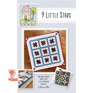 May include: A quilt pattern titled "9 Little Stars" by Cottage Lane Quilts. The design features a central square quilt with nine red star blocks on a blue and white background. Additional small project examples are shown, along with the designer's name.