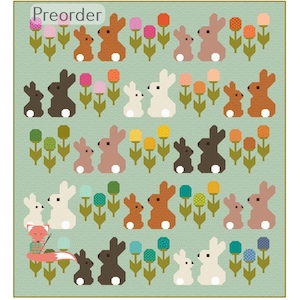 May include: A repeating pattern of bunnies and flowers in various colours on a light green background. The bunnies are in shades of brown, white, and black. The flowers are pink, orange, yellow, and green. The word "Preorder" is in the top left corner.