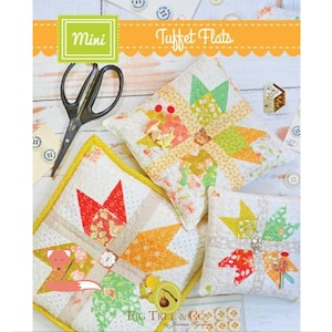 May include: A set of three mini tufted pillow covers with a variety of colorful floral patterns. The pillow covers are labeled "Mini Tuft Flats".
