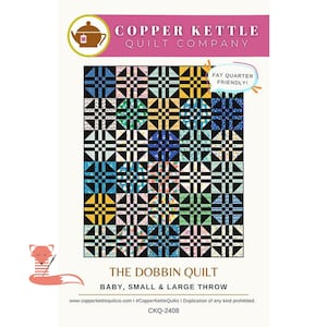 May include: A quilt pattern with a colorful patchwork design. The pattern features squares in various colors, including blue, green, yellow, and pink, with black and white accents. The text "THE DOBBIN QUILT" is displayed, along with "BABY, SMALL & LARGE THROW".