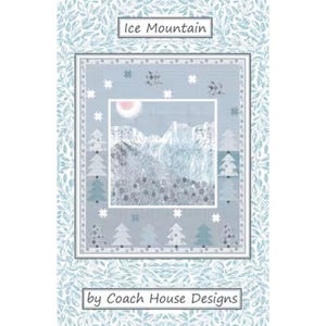 May include: A quilt pattern titled Ice Mountain by Coach House Designs featuring a central landscape of snowy mountains and a pale pink sun. The border displays stylized pine trees and star motifs in shades of blue, gray, and white, surrounded by a leafy pattern.