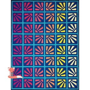 May include: A colorful quilt with a repeating pattern of sunburst designs in shades of red, orange, and yellow against a dark blue background. The quilt is divided into a grid of squares, each containing a sunburst. The overall design is geometric and vibrant.