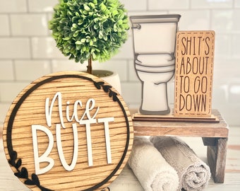 Funny bathroom signs, this is a set.  Round Nice Butt 6" with tripod & shits about to go down with toilet funny bathroom decor