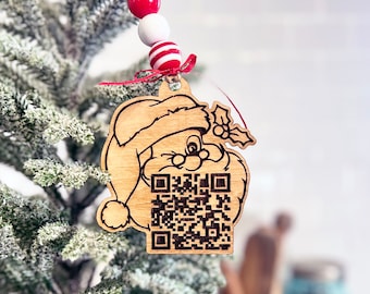 Santa tracker QR code ornament with adorable Santa image, easy for kids to use, comes as shown with beads.