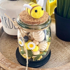 Bumblebee, honey bee bubble jar filled to the brim with a felt bee attached at the top of the cork spring / summer farmhouse tiered tray.