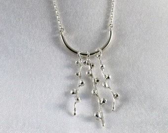 Half circle necklace in sterling silver, mini buds, long necklace