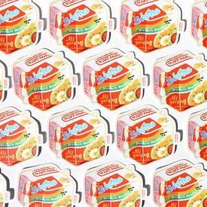 May include: A repeating pattern of colorful illustrations of instant noodle boxes. Each box has the text "Indomie" and "Mi Goreng" printed on it.