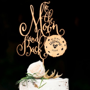 To The Moon And Back Wedding Cake Topper. Engraved surname of the bride and groom and wedding date.Rustic Personalized wedding Cake topper