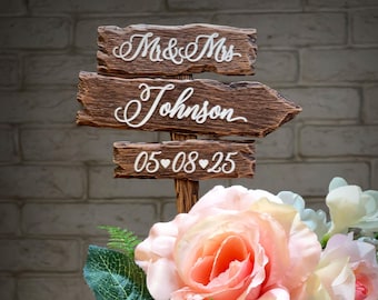 Wedding cake topper sign made of wood in an old rustic style. Rustic wedding cake topper. Old wood  wedding cake topper.