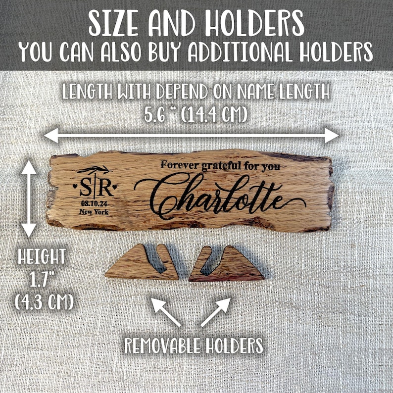 May include: A wooden sign with the text "Forever grateful for you Charlotte" and "STR 08.10.24 New York" engraved on it. The sign is 5.6 inches (14.4 cm) long and 1.7 inches (4.3 cm) high. It comes with two removable wooden holders.