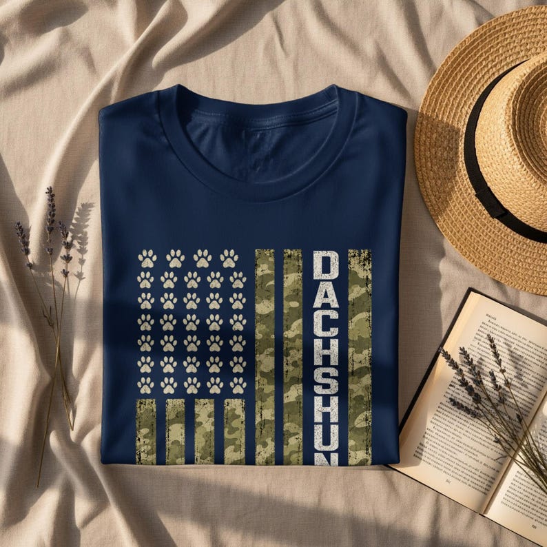 Navy t-shirt with paw print flag design and "Dachshund" text.