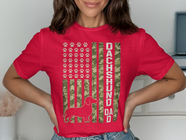 Red t-shirt with Dachshund silhouette, paw prints and "DACHSHUND DAD" text.