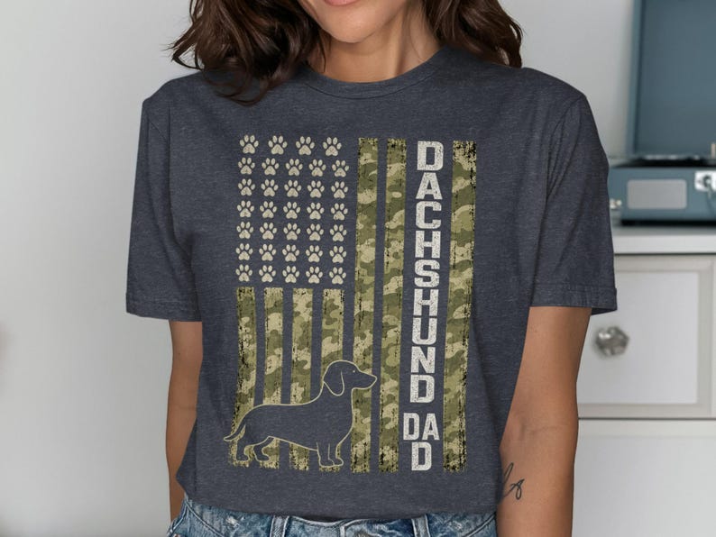 Dachshund dad text with paw print flag and silhouette of a dachshund.