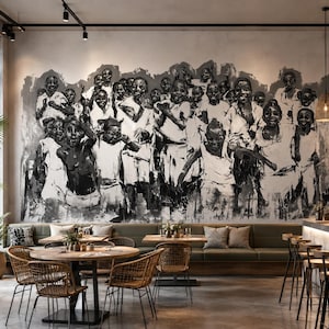 May include: A large-scale black and white wall mural depicting a crowd of children with expressive faces and varied poses. The artwork features high-contrast brushstrokes and charcoal-style shading, covering the entire wall above a seating area.