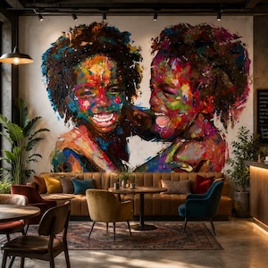 May include: A large wall mural featuring a vibrant, abstract oil painting of two laughing children with dark, curly hair. The artwork uses bold, multi-colored brushstrokes in red, blue, yellow, and green, displayed in a cafe setting with furniture.