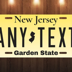 May include: A yellow license plate with the text "New Jersey" at the top and "ANY TEXT" in large black letters. The state outline is in black. The bottom reads "Garden State".