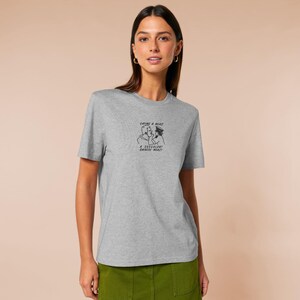 An embroidered light grey t-shirt design of the Australian Jack Karlson being arrested while he shouts Eating A Meal? A Succulent Chinese Meal?!