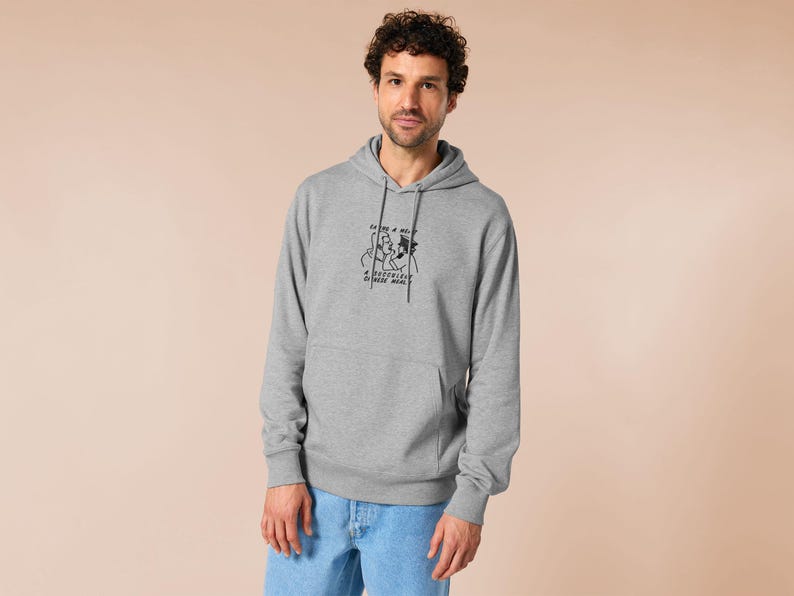 An embroidered light grey hoodie design of the Australian Jack Karlson being arrested while he shouts Eating A Meal? A Succulent Chinese Meal?!