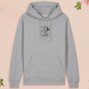 An embroidered light grey hoodie design of the Australian Jack Karlson being arrested while he shouts Eating A Meal? A Succulent Chinese Meal?!