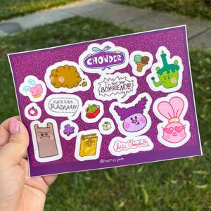 May include: A sheet of stickers featuring cartoon food and character designs. The stickers include the word "CHOWDER", a cookie, ice cream, and a green character. Other stickers have text that says "I'm Not Your BOYFRIEND!!" and "RADA RADA RADAAA!!".