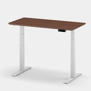 May include: White electric standing desk with a brown wood top. The desk has a control panel on the front of the top.