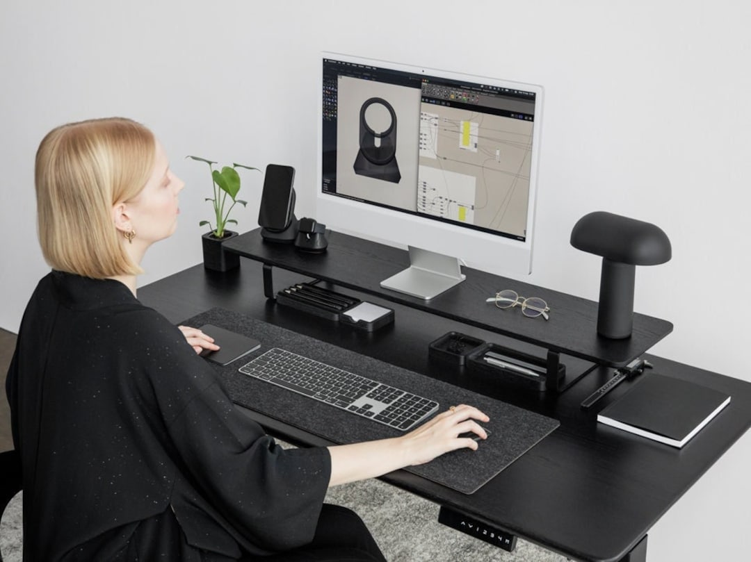 This wood monitor stand desk accessory brings improved ergonomics