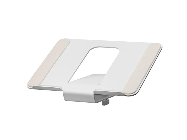 May include: A white laptop stand with a rectangular design. The stand has a cut-out in the center and two beige pads on the top surface. The stand is made of metal and has a minimalist design.