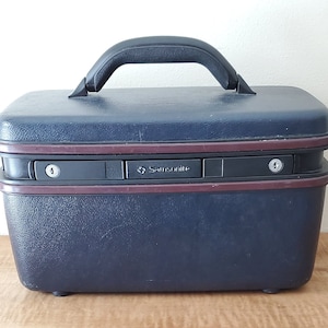 travel suitcase vintage train suitcase blue faux leather hard shell 1987 Silhouette Samsonite luggage