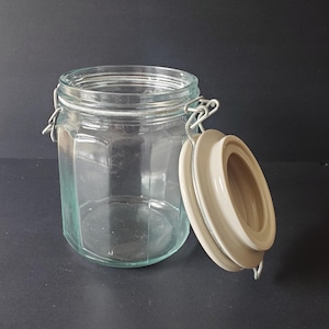 green glass canister vintage Italian paneled jar with wire bail ceramic lid