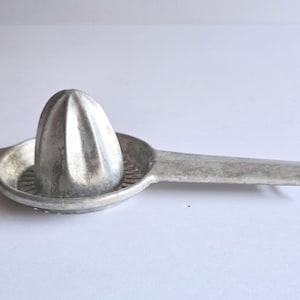 vintage citrus juicer: aluminum reamer- Foley