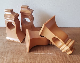 4 ornate brown resin curtain rod holders