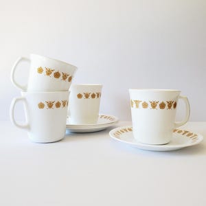 Butterfly Gold cups and saucers 4 vintage Corelle coffee cup sets