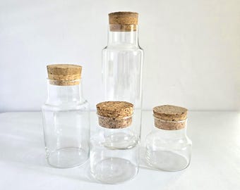 4 vintage glass canisters storage jars with cork lids