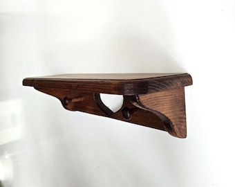 16" Vintage Pine Wall Shelf with 2 Pegs Deep Brown Finish