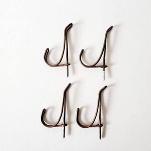 4 antique double hooks for hallway or closet