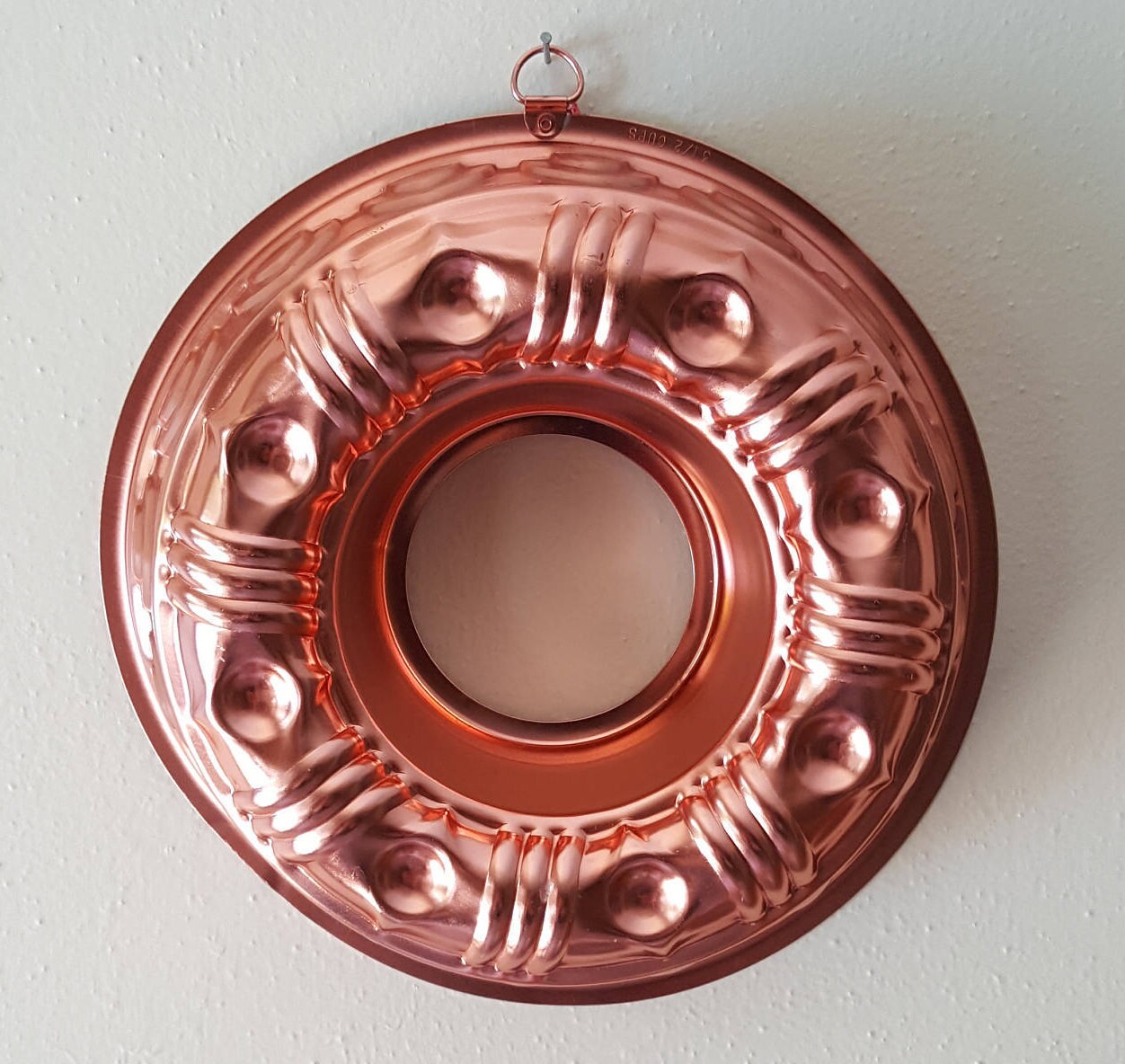 I found some copper jello molds at goodwill! Can't wait to use them! I  believe the front one is the only chance of being vintage. The other are  pinker and I don't