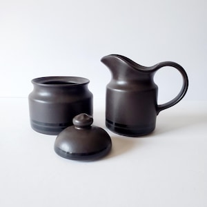 stoneware creamer and sugar pair vintage Pfaltzgraff Midnight Sun creamer and covered sugar bowl