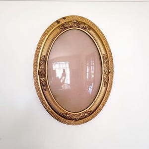 Antique Gilded Ormolu Frame: Oval Carved Floral Design, Convex Glass (19" x 25")