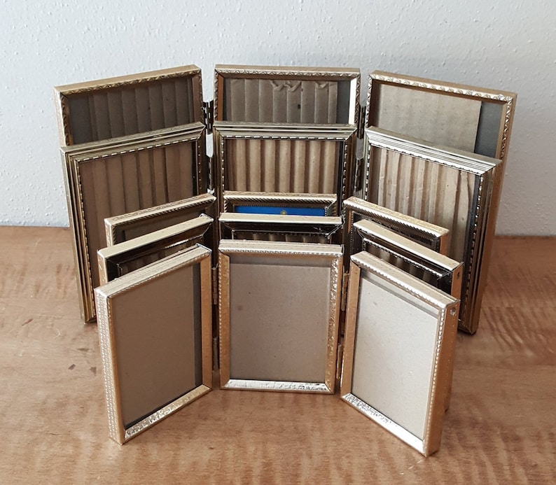 Tri Fold Hinged Gold Metal Picture Frames 3 1 2 X 5 Image 0