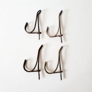 4 antique double hooks for hallway or closet  /details in description
