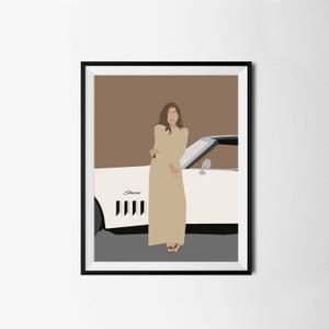 May include: A woman in a beige dress stands next to a white vintage car. The car has a black interior and a black stripe along the side. The woman is looking at the camera.