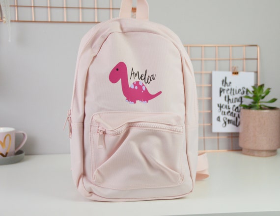 pink dinosaur backpack
