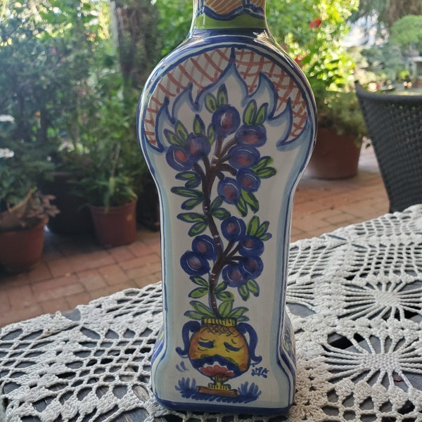 Vintage Italian country pottery bottle with floral and tile or lattice design rustic hand painted artist signed made in italy white blue