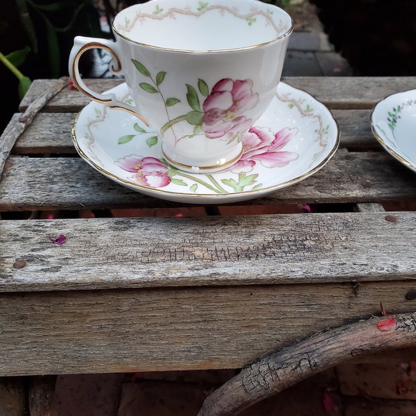 Vintage Tuscan fine bone China teacup and saucer pink floral made in England gold trim footed cup