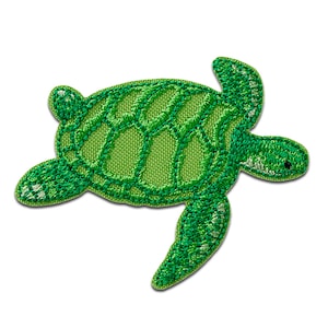 May include: Green embroidered sea turtle patch. The turtle is swimming to the right with its head turned to the left.