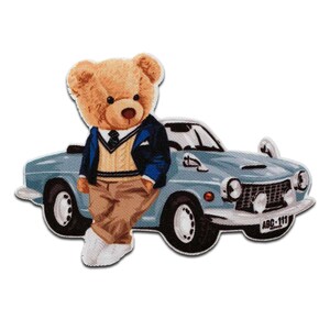 May include: A blue toy car with a teddy bear wearing a blue jacket and brown pants standing on the car. The car has a license plate that says "ABC-111".