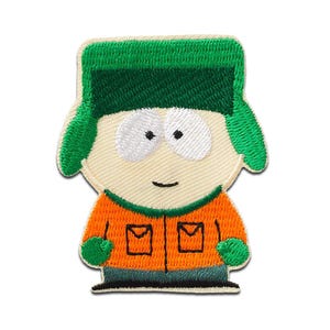 Op de afbeelding: Geborduurde patch met een stripfiguur met een groene hoed, een oranje jas en groene handschoenen. Het personage heeft een neutrale uitdrukking. De patch is bedoeld om op kleding of accessoires te worden bevestigd.