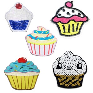 May include: Five colourful embroidered cupcake patches with various designs, including sprinkles, cherries and sequins.