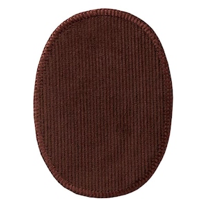 May include: A brown corduroy oval patch with a stitched edge.